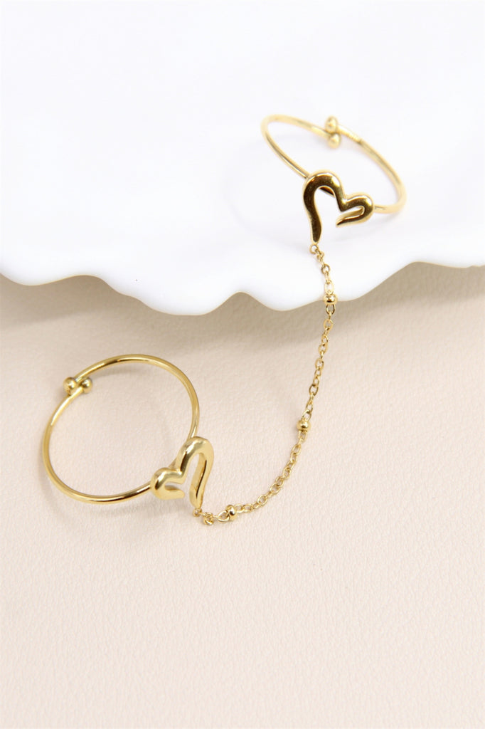Double bague cœur reliée par une chaîne ajustable en acier inoxydable